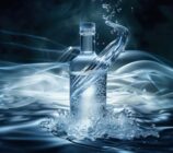 icy-water-bottle-splash-with-floating-ice-refreshing-concept-design
